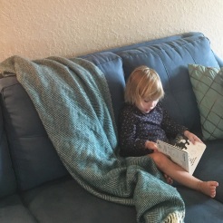 child reading book